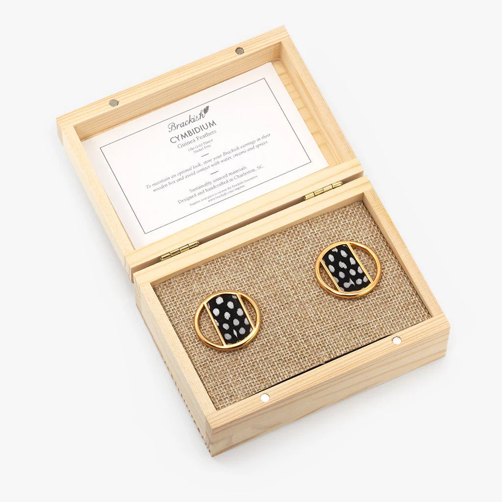 Cymbidium Guinea earring - Moxiebainbridge
