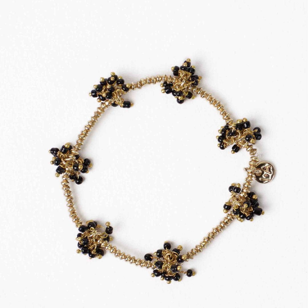Kate Gold Stretch Bracelet with Cluster Of Black Beads By Ink And Alloy