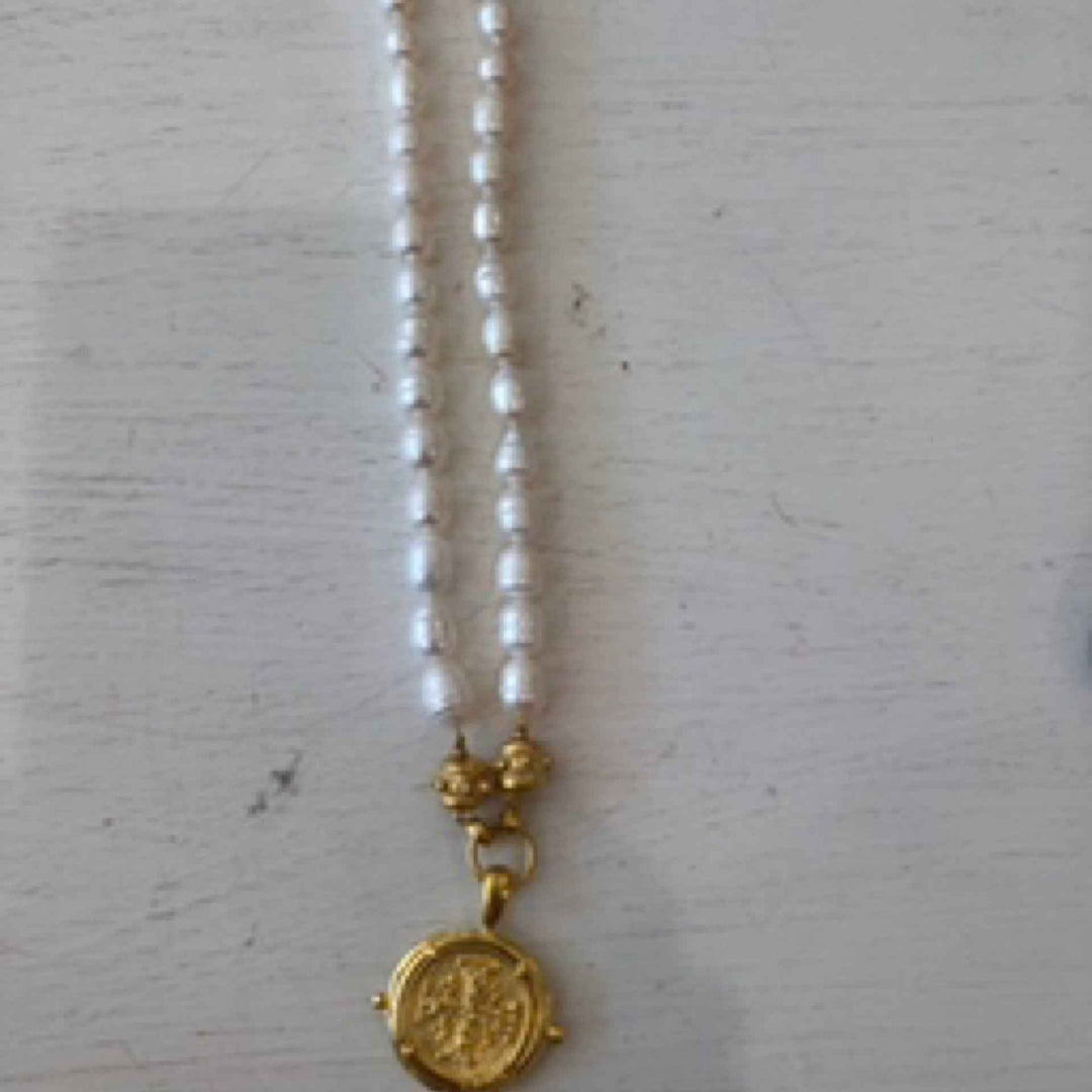 White bead, gold round cross #3738WG. 03/25