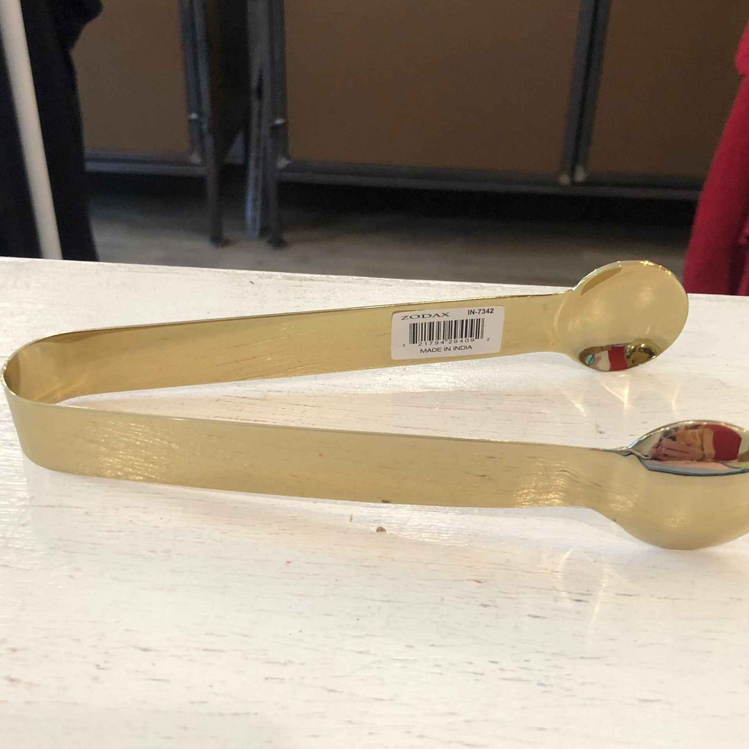 Gold ice tong
