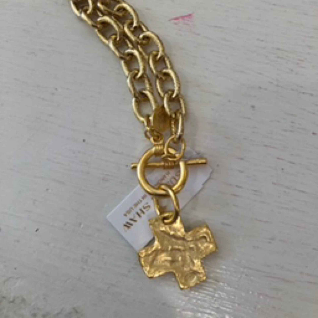 Gold bracelet w/cross. #2510CG 03/25